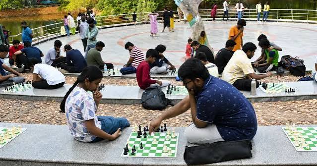 Outdoor chess event with young players